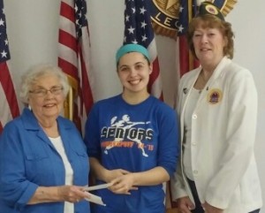 Kaylee Carney acception Lavon Juhl Memorial Scholarship with Marj Reinhardt, Chaplain and Mary Steinbach, President